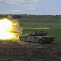 A Ukrainian tank fires in Chasiv Yar, the site of fierce battles with the Russian forces, June 7, 2023.