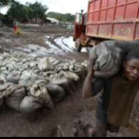 Child laborer in coltan mine