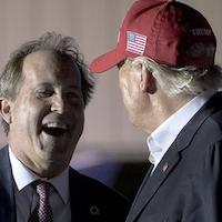 Ken Paxton grinning with Donald Trump