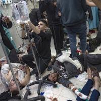 Palestinians being treated on the floor of the hospital in Khan Younis, Gaza Strip, December 5, 2023.