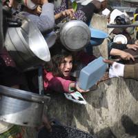 Palestinians line up desperate for food, Rafah, Gaza Strip, January 9, 2024.