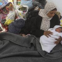 Displaced by Israeli air and ground offensive, this new Palestinian mother confronts the need for basic necessities, January 14, 2024.