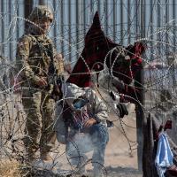 National Guard apprehends migrants on the Rio Grande in El Paso, Texas, March 21, 2024.