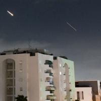 Israeli Iron Dome air defense system launches to intercept missiles fired from Iran, in central Israel, April 14, 2024.