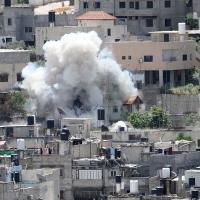 Explosion from Israeli bombardment of the Nur Shams refugee camp near the town of Tulkarem, Gaza, April 20, 2024.