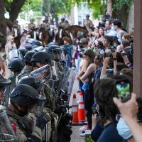 Pro-Palestinian protesters confronted by police at the University of Texas–Austin, April 24, 2024.