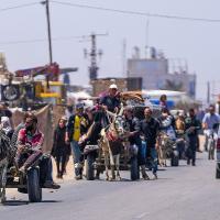 Palestinians flee before Israeli assault on the southern Gaza city of Rafah, May 9, 2024.