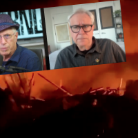 Andy Zee and Alan Goodman with Israeli bombing of Rafah in the background