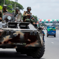 Bangladeshi army on patrol on a highway in Dhaka during the student uprising, July 23, 2024.