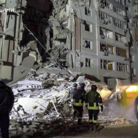 A multi-story residential building Kherson, Ukraine was heavily damaged by a Russian strike February 20, 2025.    