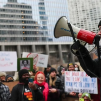 Revcom speaking to protesters in Chicago