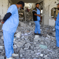 Medics inspect ruins of Al Najjar hospital destroyed by Israeli airstrikes, January 19, 2025