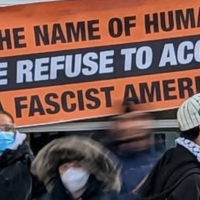 Banner: In the Name of Humanity, We Refuse to Accept a Fascist America!