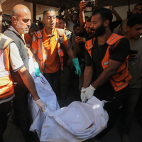 The bodies of Palestinians, killed by the Israeli army after allegedly crossing the ceasefire line, are brought to Al Ahli Hospital in Gaza City, October 18, 2025.