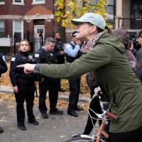 People protest ICE actions in Little Village, Chicago, November 8, 2025.