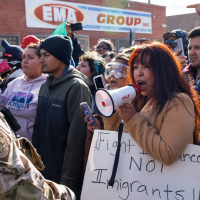 Residents yell at federal agents in Little Village neighborhood, Chicago, October 23, 2025.