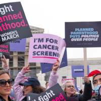 Abortion-rights activists rally outside the Supreme Court in Washington, April 2025.