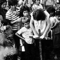 Young girl whose mother was killed by Nicaraguan contras at her mother's burial.