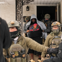 Garrison Gibson is arrested by federal immigration officers in Minneapolis, January 11