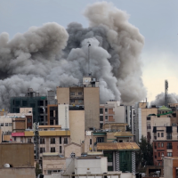 Smoke from airstrike on buildings in Tehran, Iran, March 2, 2026.
