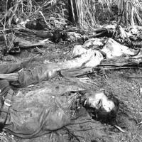 Slain bodies of massacred victims in village of El Mozote, El Salvador, 1981