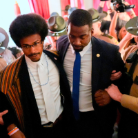 Rep. Justin J. Pearson, D-Memphis, second from left, with his brother KeShaun Pearson, as he is arrested in the House gallery, May 7, 2026.