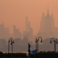 The New York City skyline through a cover of Canadian wildfire smoke, July 17, 2026.